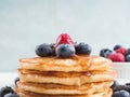 Stack of pancakes with blueberries and syrup Royalty Free Stock Photo