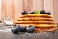 Stack of pancakes with fresh blueberry and caramel syrup Royalty Free Stock Photo
