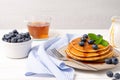 Stack of pancakes with fresh blueberry and caramel syrup Royalty Free Stock Photo