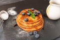 Stack of pancakes with fresh blueberry and caramel syrup Royalty Free Stock Photo