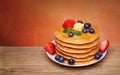 Stack of pancakes with fresh blueberry, strawberry