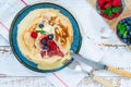 A stack of pancakes with fresh fruit Royalty Free Stock Photo