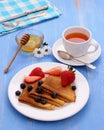 Stack of pancakes, fresh strawberry blueberry, honey Royalty Free Stock Photo