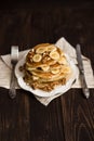 Stack of pancakes with honey,banana and walnuts Royalty Free Stock Photo