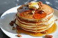 stack of pancakes with honey drizzle and nuts, side view Royalty Free Stock Photo