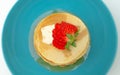 Stack of pancakes with maple syrup and berries Royalty Free Stock Photo