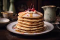 A stack of pancakes placed on a plate