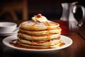 A stack of pancakes placed on a plate