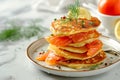 stack of pancakes with salted salmon on a plate Royalty Free Stock Photo