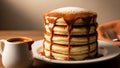 Stack of pancakes with syrup on a white plate Royalty Free Stock Photo