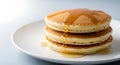 Stack of Pancakes with Syrup on a White Plate Royalty Free Stock Photo