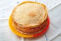 A stack of pancakes. Thin fragrant pancakes in a plate. Traditional rustic food