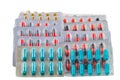 Stack panels of pills, oral medicine on white backgroun