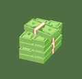 Stack of paper cash money or currency. American dollar bills or banknotes in packs and bundles isolated on green