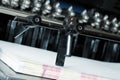 Stack paper on a printing press Royalty Free Stock Photo