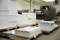 Stack of paper in a printing press. Royalty Free Stock Photo