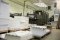 Stack of paper in a printing press. Royalty Free Stock Photo