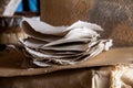 Stack of paper sheets in an ancient paper mill. Old traditional Royalty Free Stock Photo