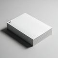 Stack of A4 Paper Sheets on a Gray Surface with Subtle Shadows Royalty Free Stock Photo