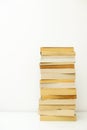 Stack of paperback books against white background with only the pages showing Royalty Free Stock Photo