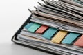 A stack of papers with colorful sticky notes on them Royalty Free Stock Photo