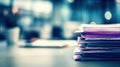 Stack of papers on desk with blurred background Royalty Free Stock Photo
