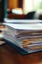 A stack of papers on a desk Royalty Free Stock Photo