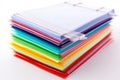 stack of papers with different colored tabs, organized in neat and tidy stack