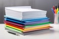 stack of papers with different colored tabs, organized in neat and tidy stack