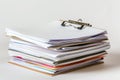A stack of papers sitting on top of each other. Suitable for office, education, or business concepts Royalty Free Stock Photo
