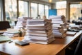 A stack of paperwork on a desk