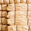 Stack of parcel wrapped in brown recycled paper