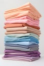 Stack of pastel colored clothes folded. Delicate color shades variations. Royalty Free Stock Photo