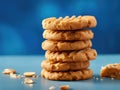 Stack of peanut butter cookies on a blue background