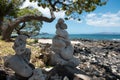 Stack of pebbles stone against sea background for spa, balance, meditation and zen theme. Royalty Free Stock Photo