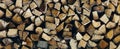 Stack pile of firewood texture pattern background, front view