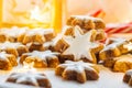 German Christmas Cookies Home Baked Glazed Cinnamon Stars. Sparkling Garland Lights Candle Candy Canes Festive Magic Royalty Free Stock Photo