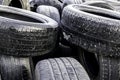 Stack pile of used car tires for recycling