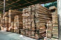 stack of pile wood bar in lumber yard factory use for construction wood industry Royalty Free Stock Photo