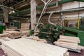 Stack of pile wood bar in lumber yard factory used in wood-processing industry