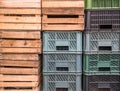 Stack or pile of wooden and plastic crates for fruits and vegetables Royalty Free Stock Photo