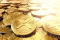 Stack or piles of golden Ripple XRP coins in blurry closeup. 3D rendering