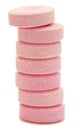 Stack of pink antacid tablets.