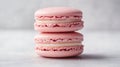 Stack of pink macarons on a light background. French patisserie and dessert concept Royalty Free Stock Photo