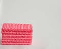 Stack of pink wafer biscuits