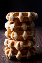 Stack of Plain Belgium Waffle on wooden surface. Royalty Free Stock Photo