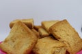 Stack of plain melba toasts on white Background. Edible square dry toast slices. Delicious crispbakes square cookies. Breakfast Royalty Free Stock Photo