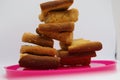 Stack of plain melba toasts on white Background. Edible square dry toast slices. Delicious crispbakes square cookies. Breakfast Royalty Free Stock Photo