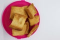 Stack of plain melba toasts on white Background. Edible square dry toast slices. Delicious crispbakes square cookies. Breakfast Royalty Free Stock Photo