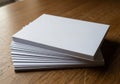 A stack of plain white index cards, neatly piled on a wooden surface Royalty Free Stock Photo